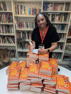 Wendy Shearer signing copies of her book: African and Caribbean Folktales, Myths and Legends