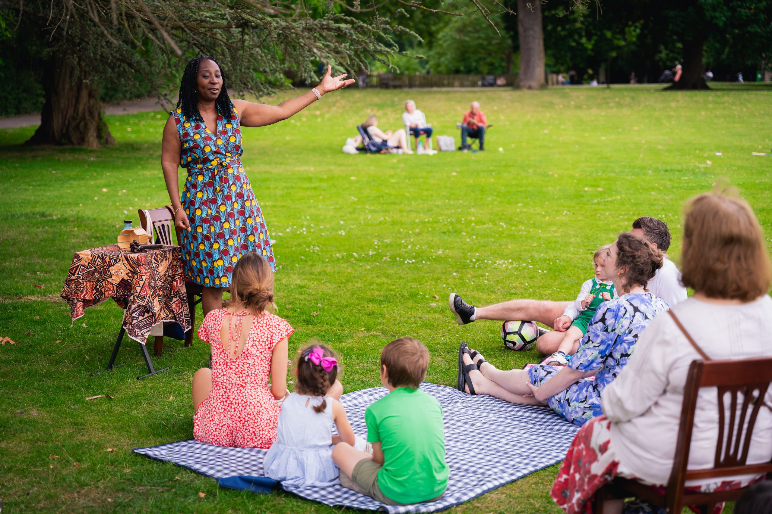Wendy Shearer storytelling in the gardens of Marble Hill House